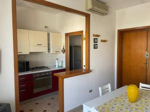 Kuchyň nebo kuchyňský kout v ubytování Casa Vacanze Luca