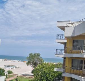 a building with a view of the beach at Alecsa 2 Luxury Residence in Mamaia