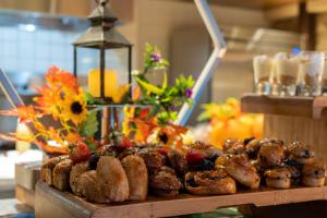 a display of pastries and fruit on a table at Hotel La Compania, In The Unbound Collection By Hyatt in Panama City