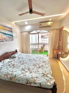 Llit o llits en una habitació de Coco Loco Colva
