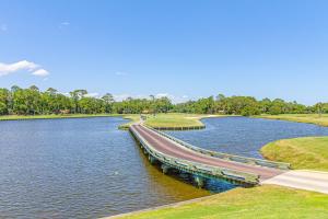 a bridge over a river in a park at Bluff Villas 1733 in Hilton Head Island