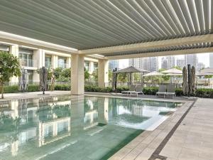 Bazén v ubytování Burj Royale - Vacationer nebo v jeho okolí