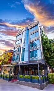 a hotel with a sign on the front of it at İstport Hotels in Arnavutköy