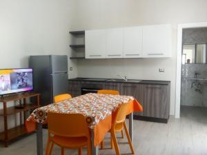 Kuchyň nebo kuchyňský kout v ubytování Amelia Apartments by My Home Apulia