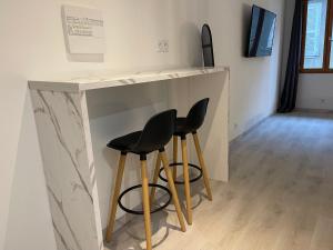 TV a/nebo společenská místnost v ubytování Appart Otel 2 Espalion