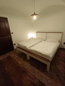 Postel nebo postele na pokoji v ubytování Apartmán Hessy