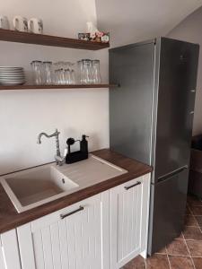 Kuchyň nebo kuchyňský kout v ubytování Apartmán Hessy