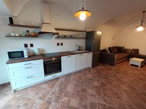 Kuchyň nebo kuchyňský kout v ubytování Apartmán Hessy