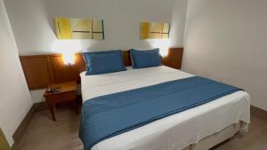 Cama o camas de una habitación en Flat c/ Garagem na Rua Borges Lagoa 1179 UH518