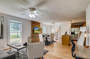 a living room with a ceiling fan and a table at 3BR 2BATH Gorgeous Country Near Nashville F1 in Franklin