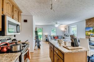 a kitchen and living room with a counter top at 3BR 2BATH Gorgeous Country Near Nashville F1 in Franklin