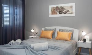 Ένα ή περισσότερα κρεβάτια σε δωμάτιο στο Apartment Feratjer +9 φωτογραφίες