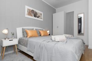 Ένα ή περισσότερα κρεβάτια σε δωμάτιο στο Apartment Feratjer