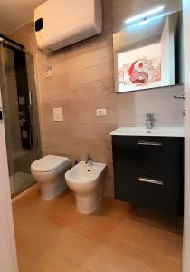 Koupelna v ubytování Piazza Teatro Apartments & Rooms