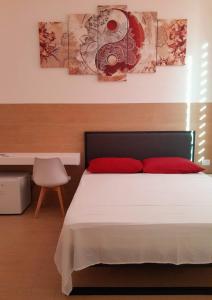 Postel nebo postele na pokoji v ubytování Piazza Teatro Apartments & Rooms