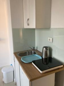 Eldhús eða eldhúskrókur á ORA apartments