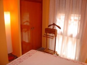 Posteľ alebo postele v izbe v ubytovaní Hostal Restaurante Arasa