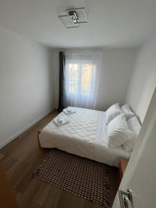 Vuode tai vuoteita majoituspaikassa Apartment TIM