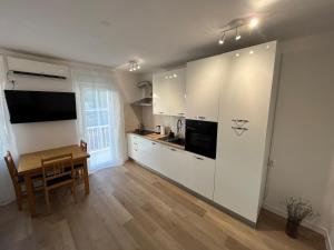 Majoituspaikan Apartment TIM keittiö tai keittotila