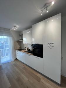 Majoituspaikan Apartment TIM keittiö tai keittotila