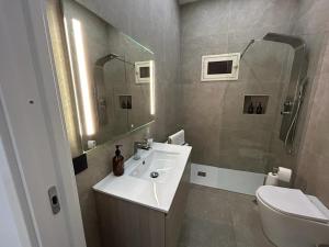 A bathroom at MEA Suite