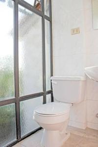 Ванна кімната в Acogedora casa en Reñaca