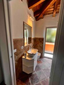 Koupelna v ubytování Prestige San Teodoro Straula + 21 fotografií