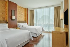 Ліжко або ліжка в номері The Westin Lima Hotel & Convention Center
