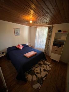 Postel nebo postele na pokoji v ubytování Hostal waiwen