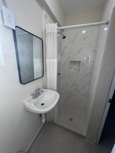 Koupelna v ubytování HOTEL VILLAGRAN