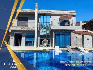 Photo de la galerie de l'établissement The Gray Villa Deadsea, à Al Rama