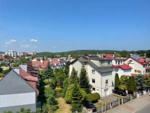 an aerial view of a city with houses at Apartament Bea Mar in Gdynia