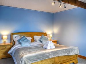 Postelja oz. postelje v sobi nastanitve Newlyn Cottage