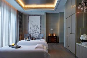 Voodi või voodid majutusasutuse The Ritz-Carlton, Macau toas
