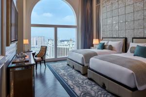 Voodi või voodid majutusasutuse The Ritz-Carlton, Macau toas