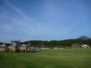a park with a playground in a field at Awone Shirakami Juniko in Fukaura