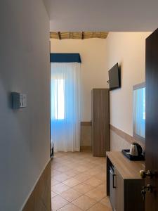 Kuchyň nebo kuchyňský kout v ubytování Hotel Alex Square