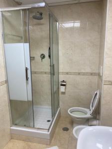 Koupelna v ubytování Hotel Alex Square