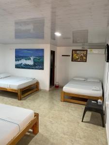 Postel nebo postele na pokoji v ubytování Hotel Agroturistico Palma Vino