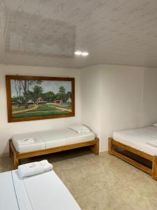 Postel nebo postele na pokoji v ubytování Hotel Agroturistico Palma Vino