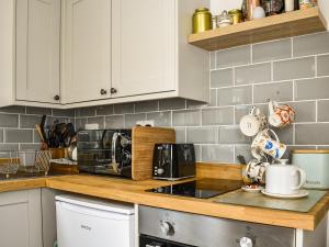 A cozinha ou cozinha compacta de The Nook