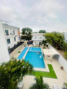 Bazén v ubytování Casa de Huéspedes Playas Arena nebo v jeho okolí