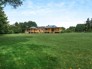 a house in a field with a large yard at Zambezi - Uk44827 in Holton