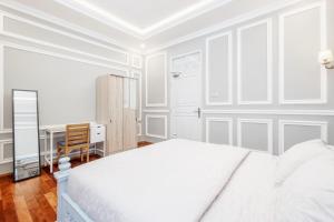 Postel nebo postele na pokoji v ubytování Desa Residence