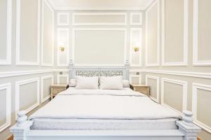Postel nebo postele na pokoji v ubytování Desa Residence