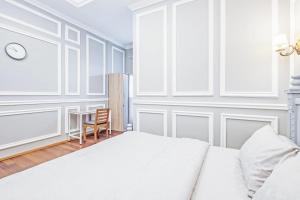 Postel nebo postele na pokoji v ubytování Desa Residence