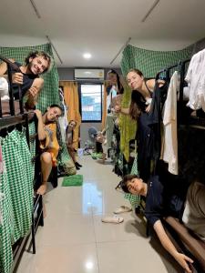 a group of people in a dressing room at Doze Hostel in Chiang Mai