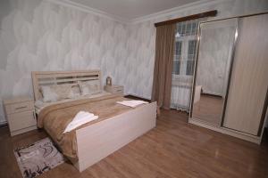Postel nebo postele na pokoji v ubytování Guest House