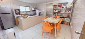 Kuchyň nebo kuchyňský kout v ubytování Dan Bao Homestay