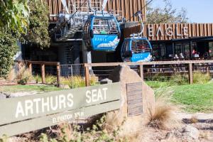 a sign in front of an entrance to an atrium set at Dream Views at Arthurs Seat B & B in Arthurs Seat